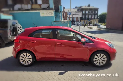 Red hatchback bought from its owner